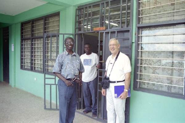 Dr. Obeng and Dan Boyd in front of the Ghana Bible College Library - October 2000