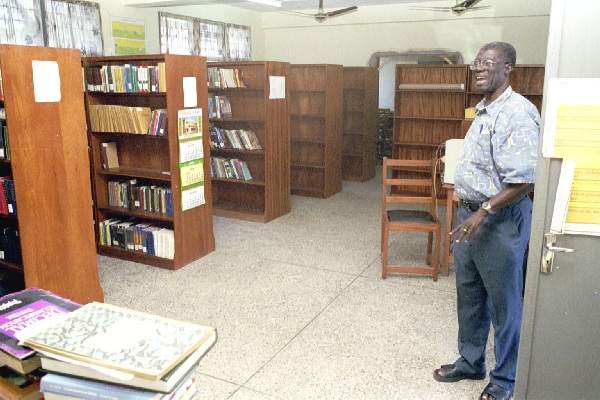 Ghana Bible College library with Dr. Obeng on right - October 2000